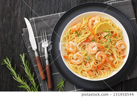 yummy spaghetti with shrimps in a white bowl 131958544