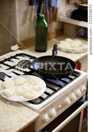 Adding Oil to Frying Pan for Cooking Adding Oil to Frying Pan for Cooking 131958671