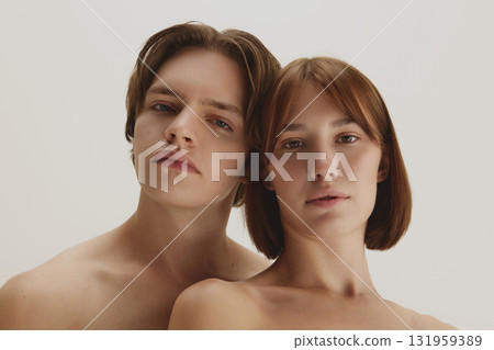 Confident couple with natural bare skin showing skincare perfection Confident couple with natural bare skin showing skincare perfection 131959389