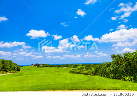 A refreshing tropical blue sky and blue sea, a resort golf course, and the cityscape in the background (Miyakojima City, Okinawa Prefecture) 131960330