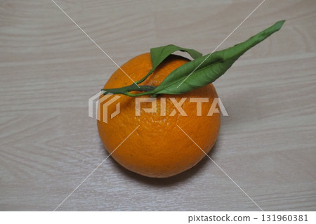 Mandarin oranges with leaves Mandarin oranges with leaves 131960381