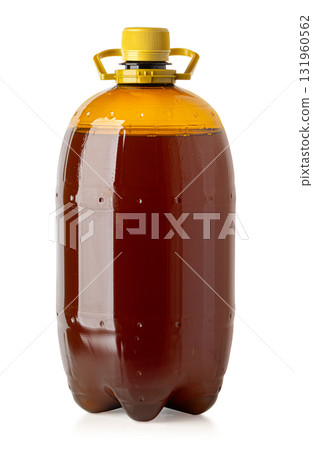 Fresh beer in large plastic growler bottle Fresh beer in large plastic growler bottle 131960562