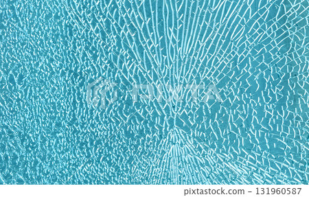 Shattered blue tempered glass texture with breaking lines 131960587