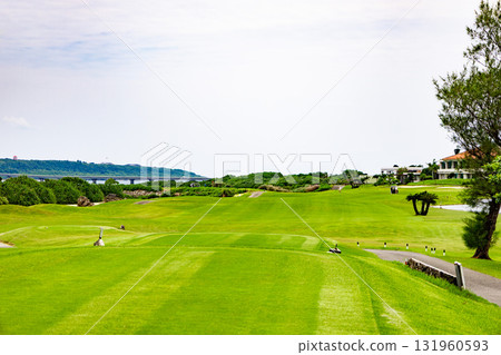 A resort golf course with a refreshing tropical blue sky, blue sea, Kurima Bridge, and vibrant grass (Miyakojima City, Okinawa Prefecture) A resort golf course with a refreshing tropical blue sky, blue sea, Kurima Bridge, and vibrant grass (Miyakojima City, Okinawa Prefecture) 131960593