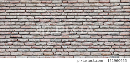 Weathered brick wall showing vintage masonry texture background Weathered brick wall showing vintage masonry texture background 131960633