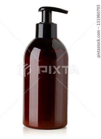 Brown cosmetic pump bottle dispensing liquid soap 131960705