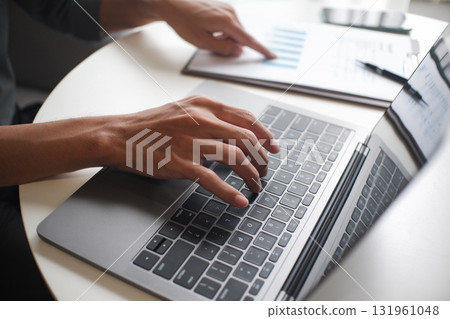 Closeup hand of unrecognizable businessman, entrepreneur, accountant, banker at the workplace Closeup hand of unrecognizable businessman, entrepreneur, accountant, banker at the workplace 131961048