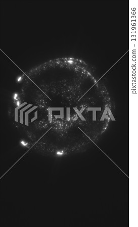 Abstract glowing circular structure in monochrome tones with scattered light particles forming a cosmic ring 131961366