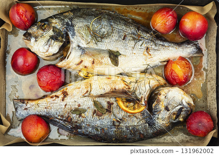 Roasted whole sea bream fish or dorado, close up. Roasted whole sea bream fish or dorado, close up. 131962002