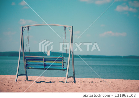 Swing on the shore of a reservoir Swing on the shore of a reservoir 131962108