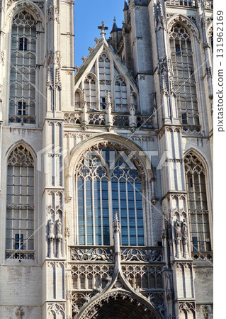 Cathedral of Our Lady, Antwerp, Belgium, looking up at the historic gothic architecture and intricate detailing of the facade. Antwerp, Belgium Cathedral of Our Lady, Antwerp, Belgium, looking up at the historic gothic architecture and intricate detailing of the facade. Antwerp, Belgium 131962169