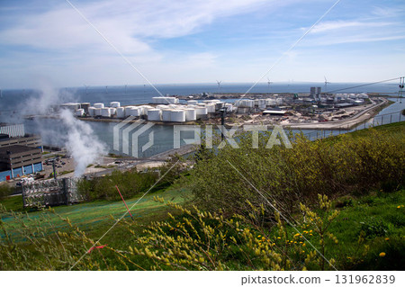 Amager Bakke known as Amager Slope or Copenhill, combined heat and power waste to energy plant with recreational facility, dry ski run and hiking trail, Copenhagen, Denmark 131962839