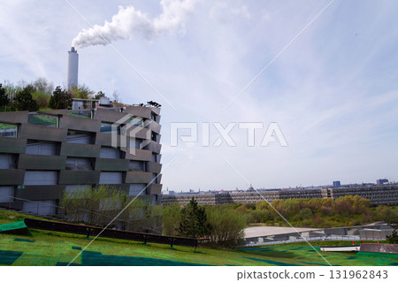 Amager Bakke known as Amager Slope or Copenhill, combined heat and power waste to energy plant with recreational facility, dry ski run and hiking trail, Copenhagen, Denmark 131962843