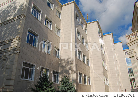 The building of the international academic school in Odessa. The richly decorated building with neoclassical architecture has a central golden dome topped with a cross. 131963761