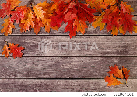 Hello, Autumn A vibrant autumn abstract composition with maple leaves, a beautiful still life, and a Thanksgiving concept, banner and design template, greeting card, and greetings 131964101