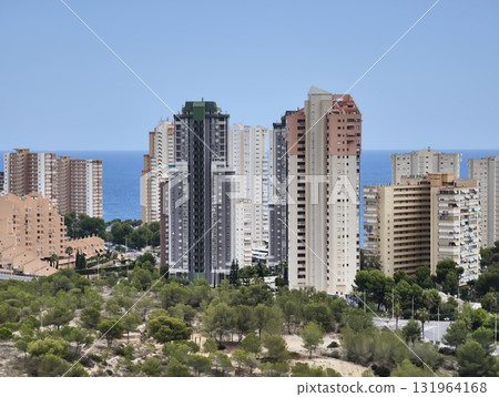 A stunning Coastal City Skyline with modern architecture and sea views, perfect for relaxing A stunning Coastal City Skyline with modern architecture and sea views, perfect for relaxing 131964168