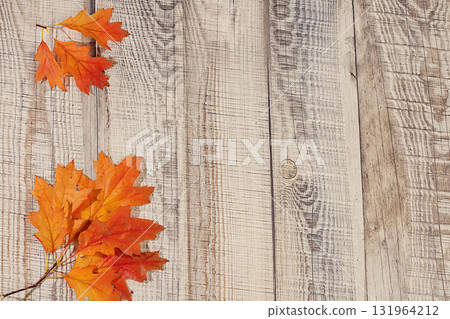 Hello, Autumn A vibrant autumn abstract composition with maple leaves, a beautiful still life, and a Thanksgiving concept, banner and design template, greeting card, and greetings 131964212