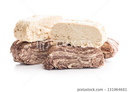Halva with cocoa. Sweet oriental dessert isolated on white background. 131964681