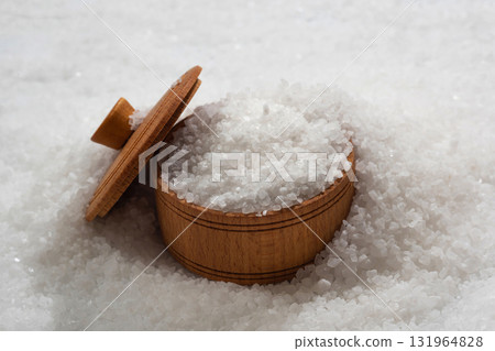Close up of sea salt in a wooden bowl 131964828
