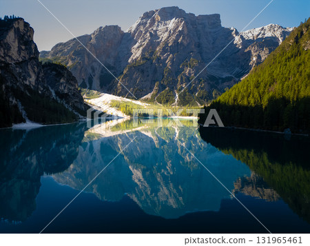 Experience the breathtaking and stunning mountain reflection in a crystal clear lake Experience the breathtaking and stunning mountain reflection in a crystal clear lake 131965461