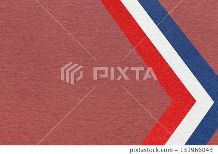 Maroon textured paper background with red, white, blue arrow shapes and copy space. Abstract geometric banner 131966043