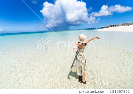 Summer clouds and emerald beach resort 131967891