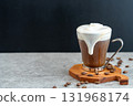The cream in the Viennese coffee overflows from the cup 131968174