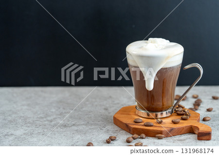 The cream in the Viennese coffee overflows from the cup 131968174