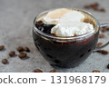 Viennese coffee (Einspänner) poured into a cup 131968179