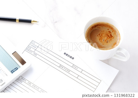 Business Plan - Image of an entrepreneur creating a business plan prior to launching a new business 131968322