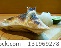 A photo of grilled salted yellowtail collar, a simple yet delicious dish with plenty of fat. 131969278