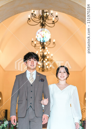 Wedding venue, bride and groom walking down the chapel (aisin aisle, church, chapel) 131970284