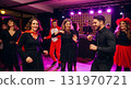 Halloween party celebration Diverse group of friends dancing together. 131970721