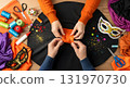 Crafting colorful masks with fabric and embellishments, topdown view 131970730