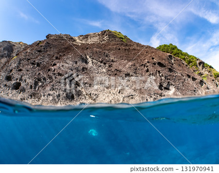 Half-surface photo of the Hirizohama ferry boat with the captain and skin divers on board. Hirizohama, Nakagi, Minamiizu Town, Izu Peninsula, Shizuoka Prefecture 131970941