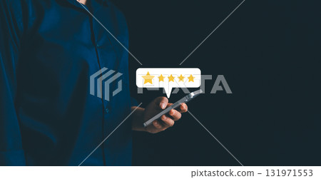 Businesswoman holding smartphone with floating customer review icons and star ratings, concept of online feedback, digital marketing, reputation management, customer satisfaction. satisfaction Businesswoman holding smartphone with floating customer review icons and star ratings, concept of online feedback, digital marketing, reputation management, customer satisfaction. satisfaction 131971553