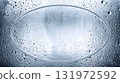 Background material of glass with water droplets and an oval space in the center 131972592