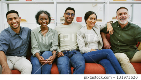 Team portrait, smile and business people on couch for solidarity, about us or writers laugh. Group, sofa and happy workers in office lounge with creative editor for support, pride or collaboration 131973620