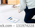 A man in work clothes checking furniture 131974228