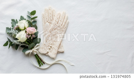 Elegant wedding accessories flat lay with a flower bouquet and vintage lace gloves. Romantic bridal concept with copy space Elegant wedding accessories flat lay with a flower bouquet and vintage lace gloves. Romantic bridal concept with copy space 131974805