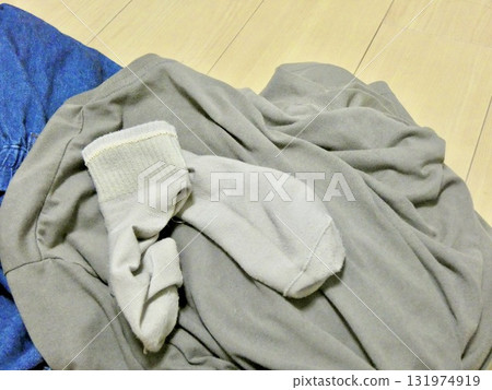 Messy clothes and socks 131974919