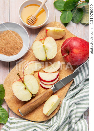 Baking ingredients for apple dessert on wooden table Baking ingredients for apple dessert on wooden table 131976060