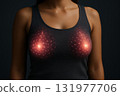 Breast cancer awareness concept with glowing digital network on female chest highlighting breast health and early detection for medical research and prevention efforts 131977706