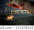 people who play sparklers 131978544
