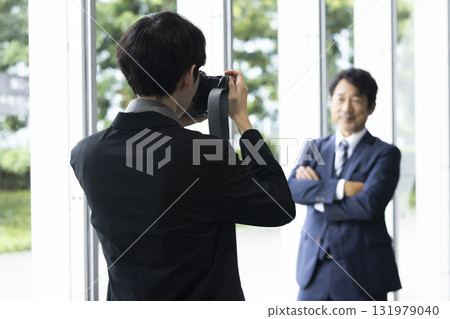 Photographer and businessman 131979040