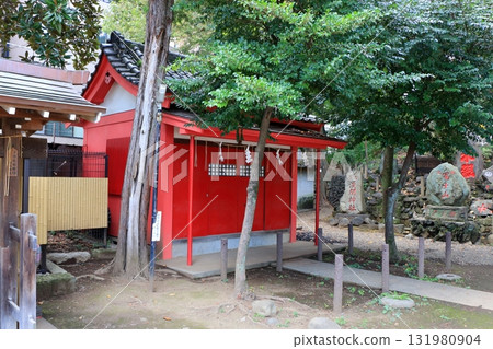 Komagome Fuji Jinja in Bunkyo-ku Tokyo Japan is a Shinto Shrine on a manmade hill called a Fujizaka using rocks from Mt. Fuji, founded around 1573 and dedicated to Japanese firefighters. Komagome Fuji Jinja in Bunkyo-ku Tokyo Japan is a Shinto Shrine on a manmade hill called a Fujizaka using rocks from Mt. Fuji, founded around 1573 and dedicated to Japanese firefighters. 131980904