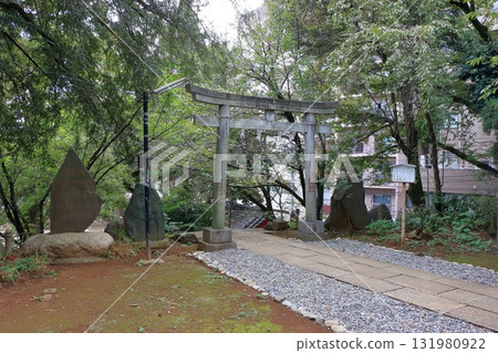 Komagome Fuji Jinja in Bunkyo-ku Tokyo Japan is a Shinto Shrine on a manmade hill called a Fujizaka using rocks from Mt. Fuji, founded around 1573 and dedicated to Japanese firefighters.  131980922