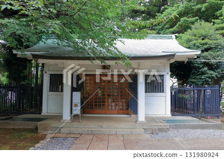 Komagome Fuji Jinja in Bunkyo-ku Tokyo Japan is a Shinto Shrine on a manmade hill called a Fujizaka using rocks from Mt. Fuji, founded around 1573 and dedicated to Japanese firefighters.  131980924