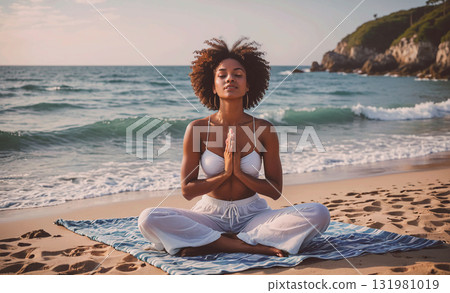 Man and woman are sitting on a mat in a park, practicing yoga together. The man is smiling and the woman is also smiling, creating a positive and relaxed atmosphere 131981019