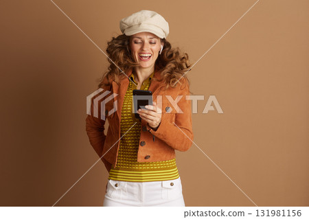 Laughing Woman Enjoying Smartphone Content 131981156
